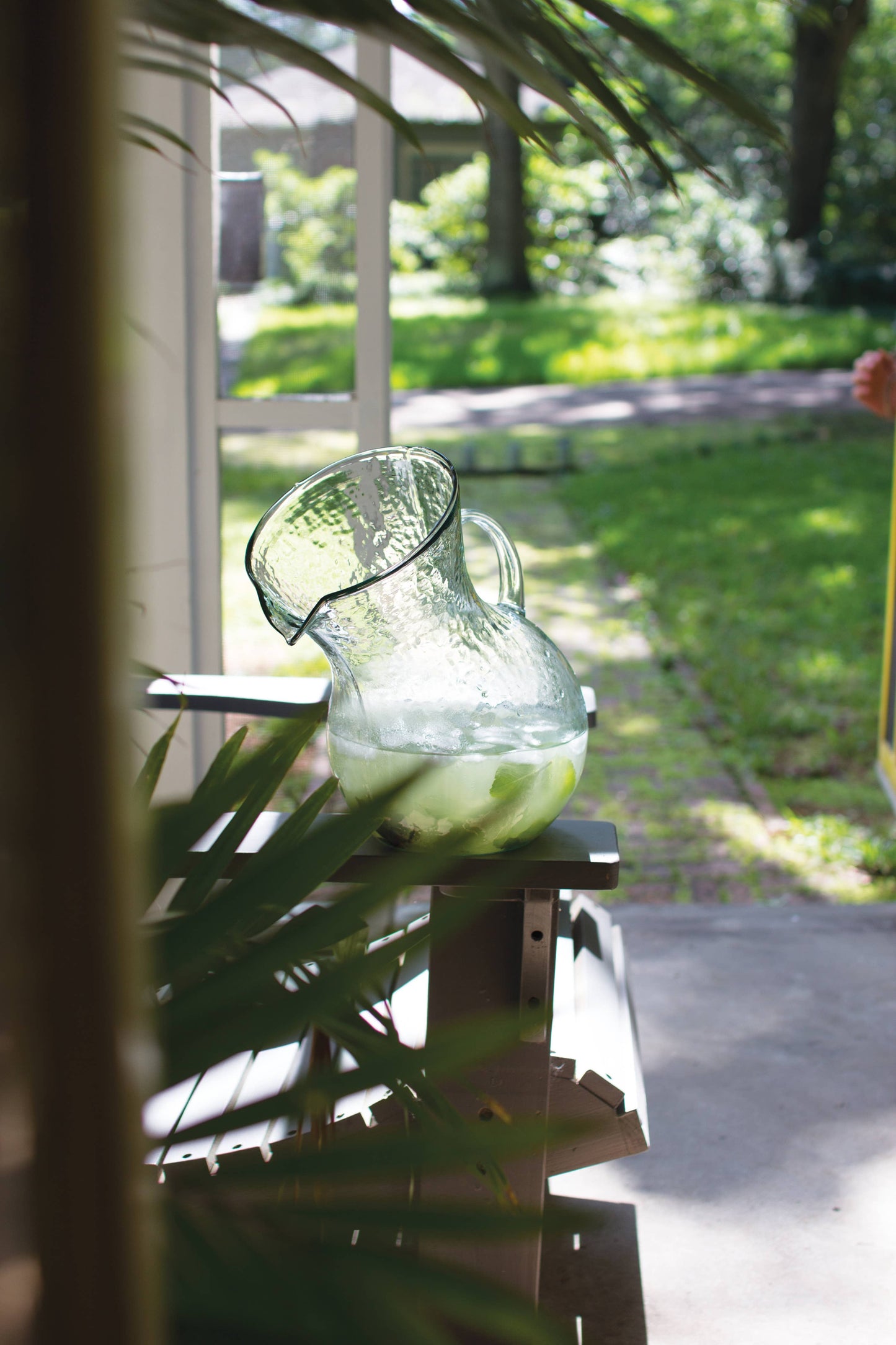 TILTED GLASS PITCHER